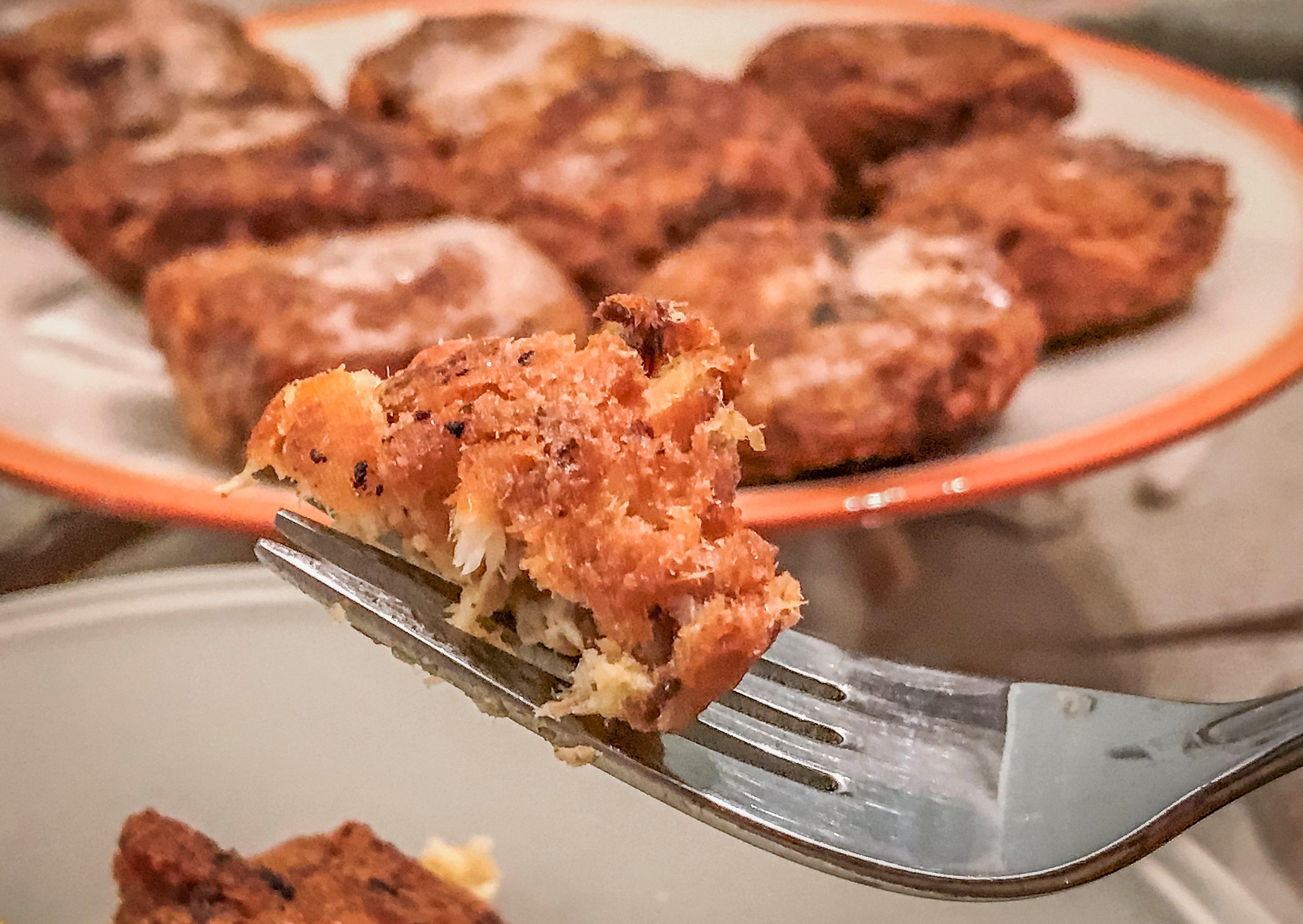 The mullet cakes should be crisp on the outside and moist and flaky in the center.