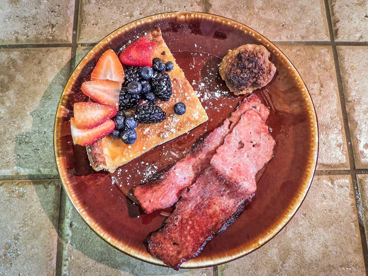 Slice the pancakes into wedges and serve with sides like venison bacon or sausage.