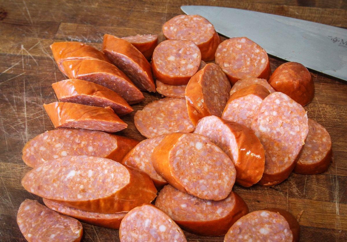 Slice up a pound of your favorite smoked sausage or andouille. 