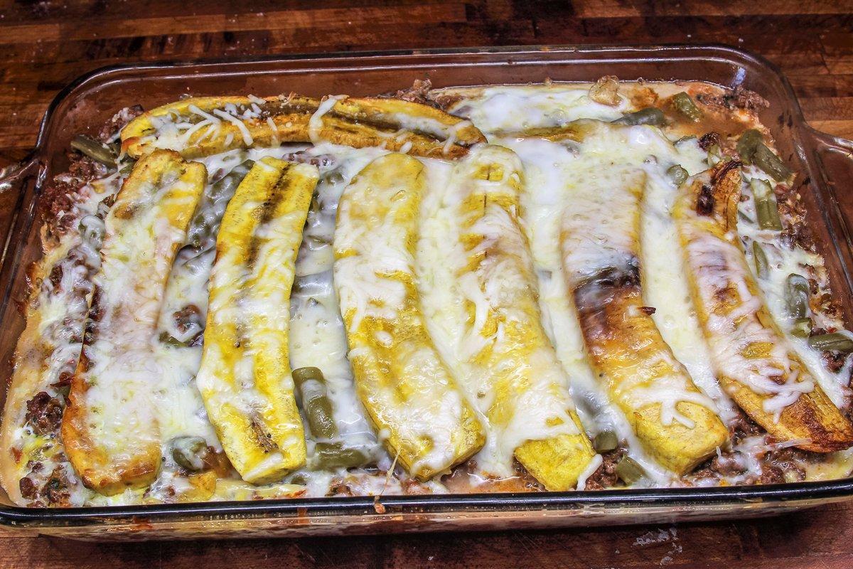 Bake the casserole to allow the flavors to blend and the cheese to melt. 