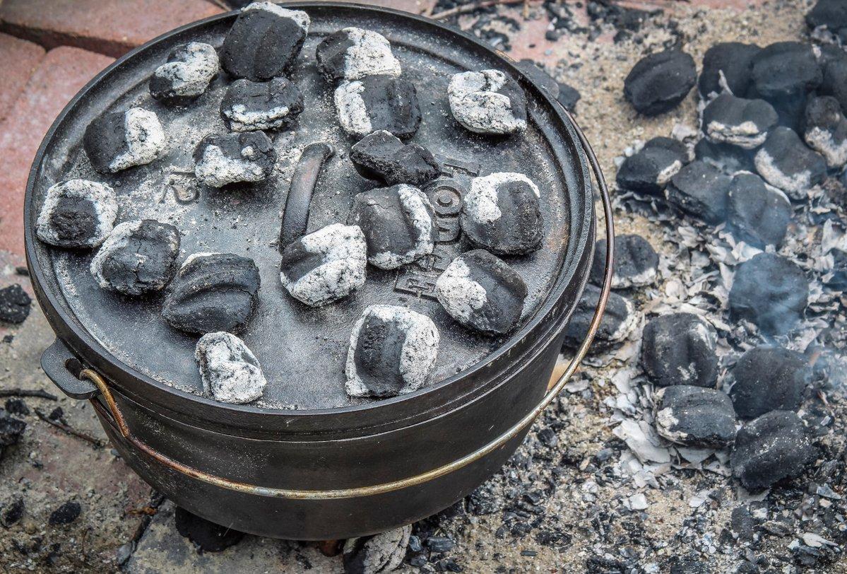 Add coals to cook from both above and below with your Dutch oven.