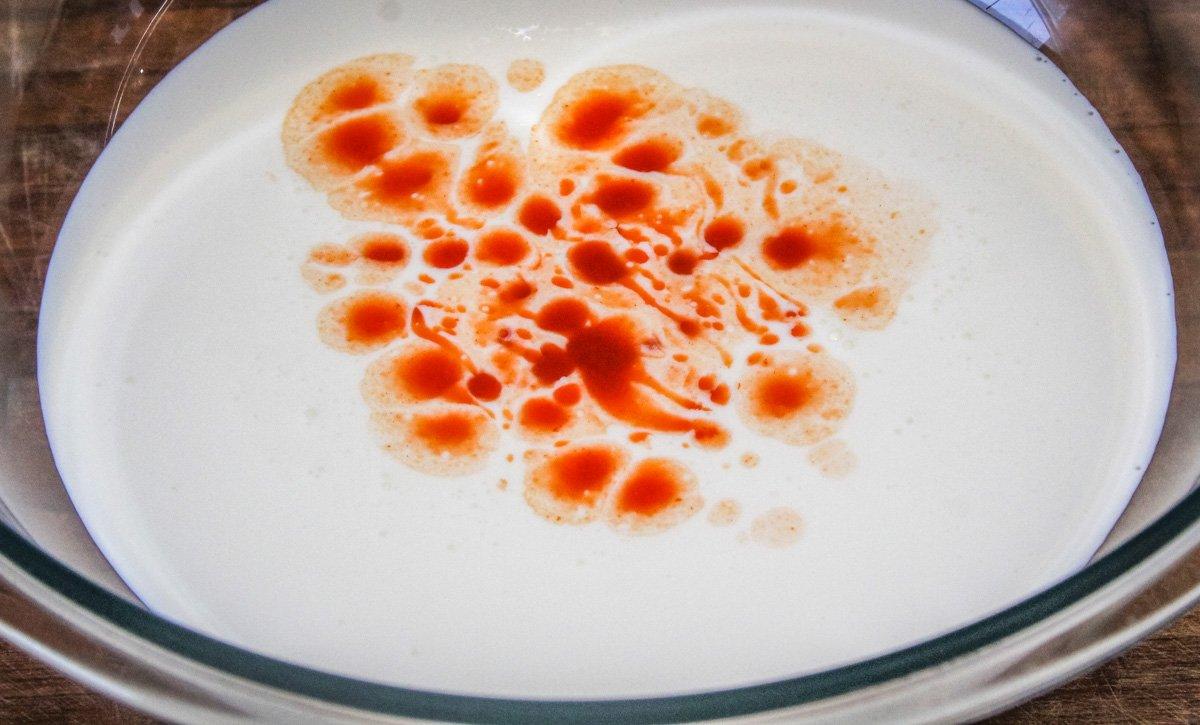 Add hot sauce to the buttermilk.