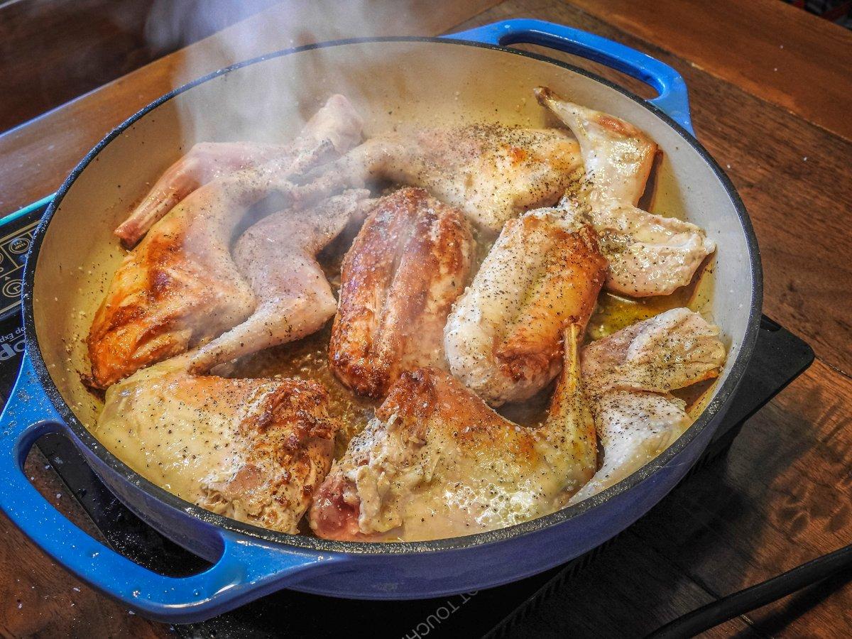 Sear the rabbit in olive oil until it is golden brown. 