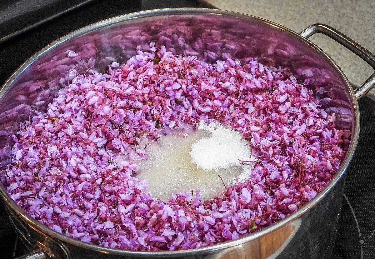 Bring the water and blossom mixture to a light boil and add 1 cup of sugar.