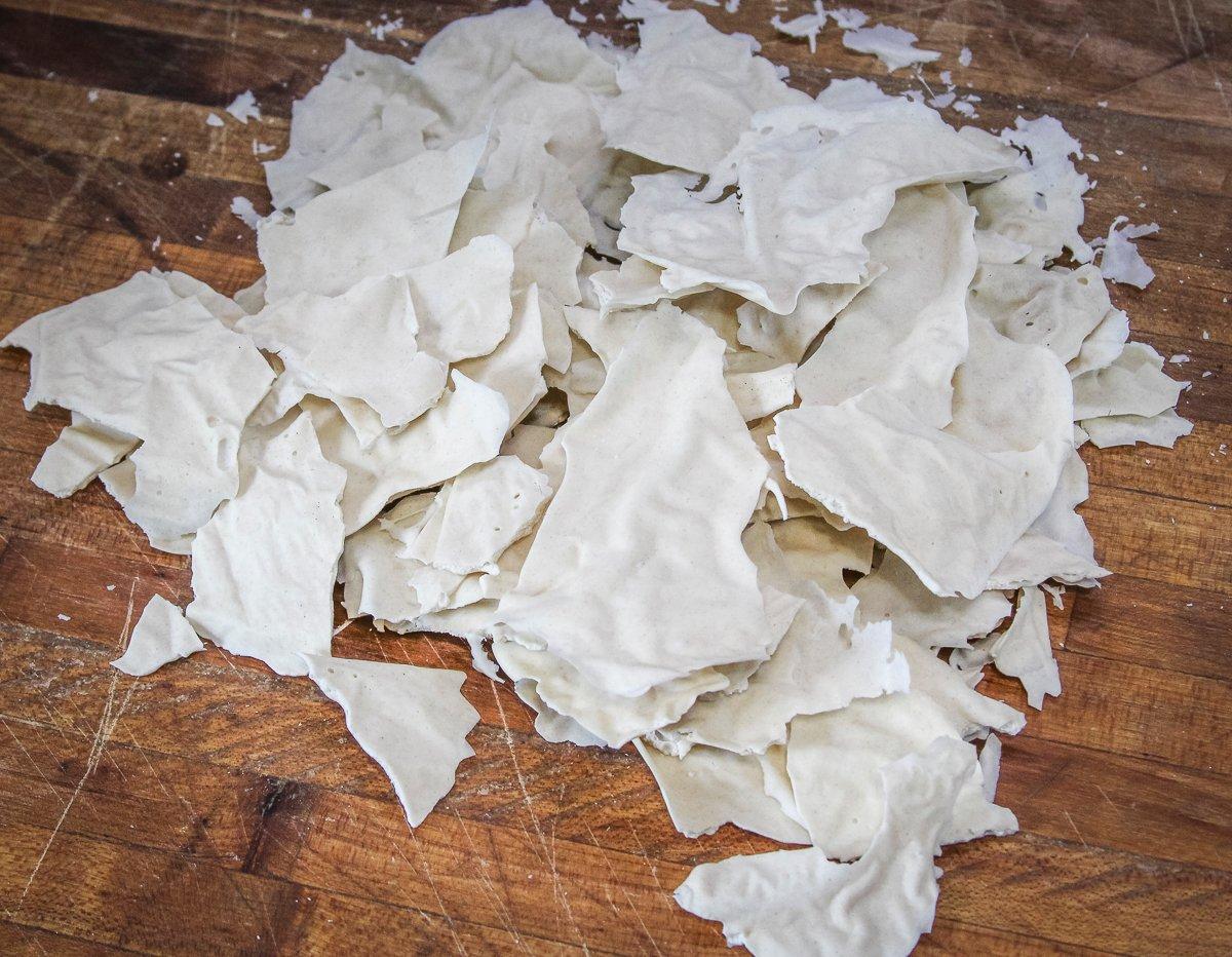 Once it is dry, peel the starter off the parchment and break into small pieces.