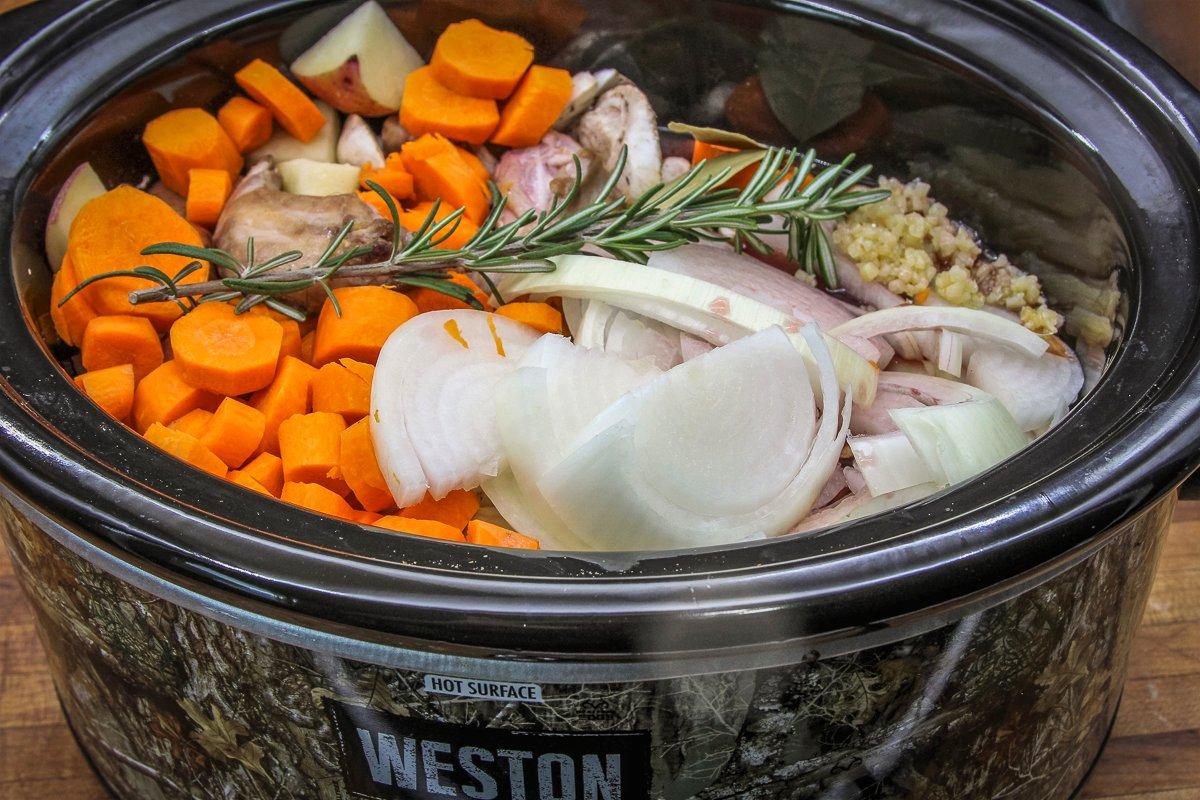 Add the browned squirrel pieces along with the remaining ingredients to the slow cooker.