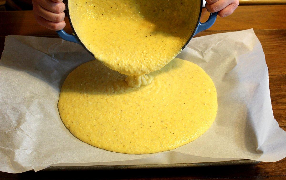 Spread the finished grits into a parchment lined sheet pan before chilling overnight.