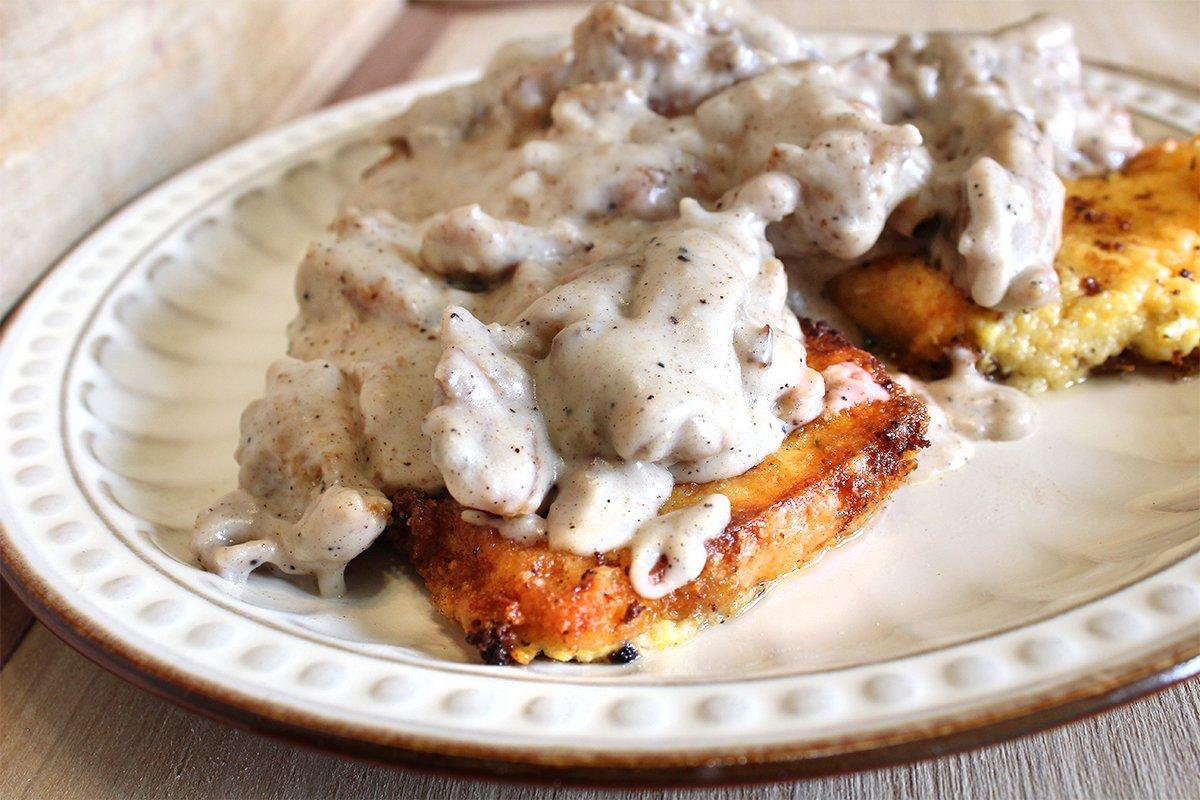 Spoon the creamy squirrel gravy over the grit cakes just before serving.