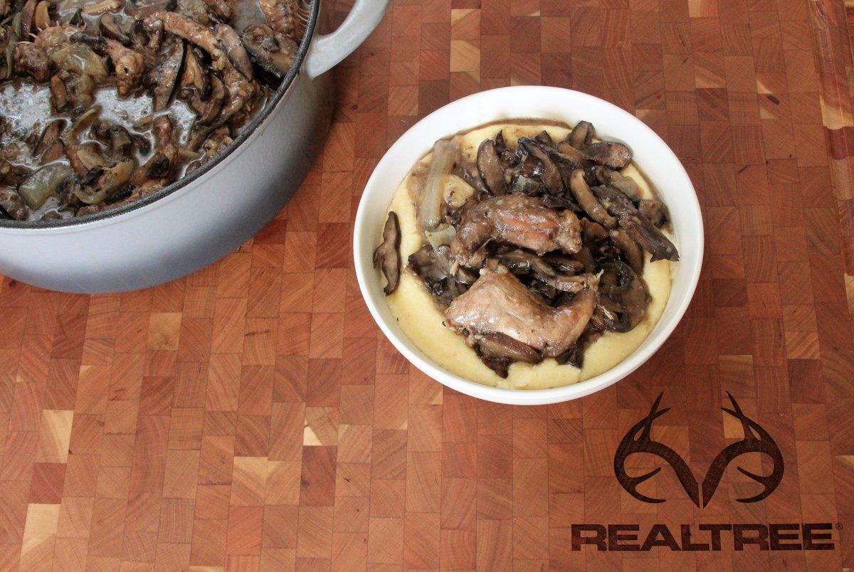 Serve the squirrel and mushrooms over a bowl of creamy, cheesy grits.
