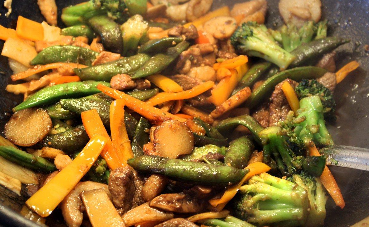 Cook everything hot and fast so that the vegetables are just cooked through and still a bit crisp.