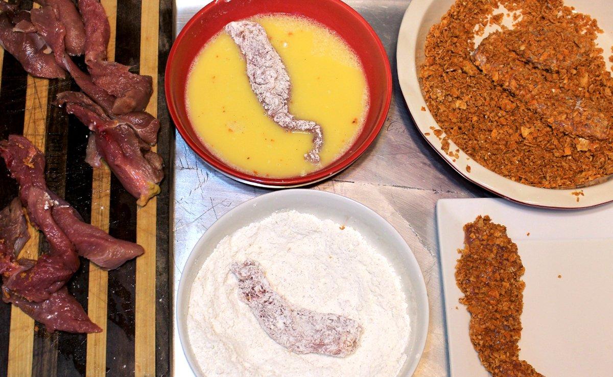 Dip each strip in flour and beaten egg, then roll in the crushed chips.