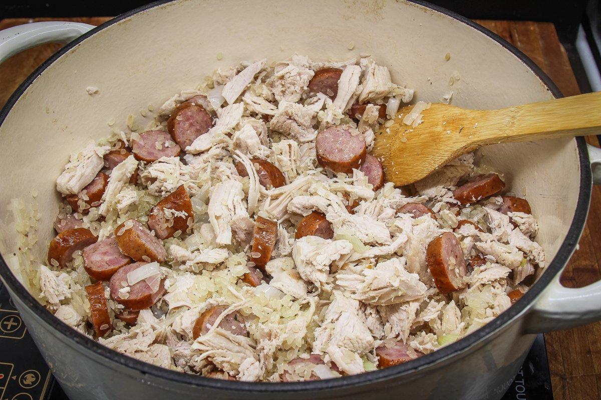 Brown the sausage with more onion before adding the shredded turkey and rice.