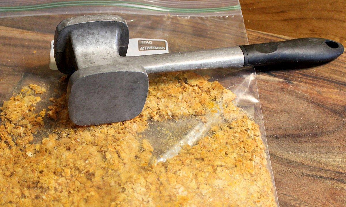Crush the chips with the smooth side of a meat mallet.