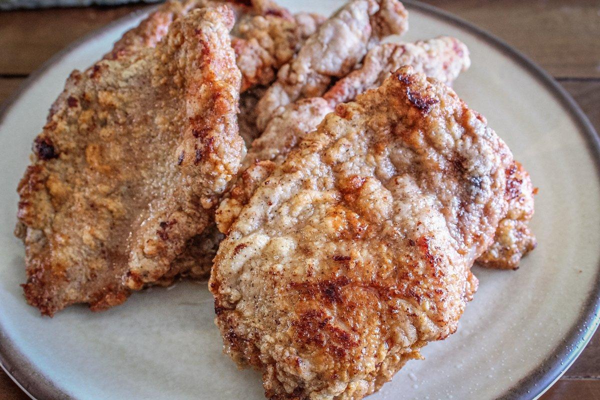Dredge the turkey cutlets in seasoned flour and fry till crisp and just cooked through.
