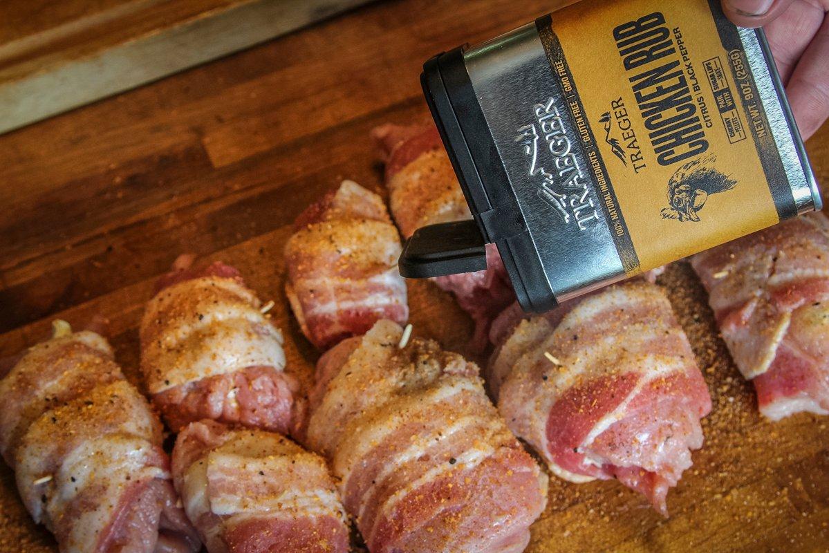 Wrap the turkey with bacon and season well with Traeger Chicken Rub.