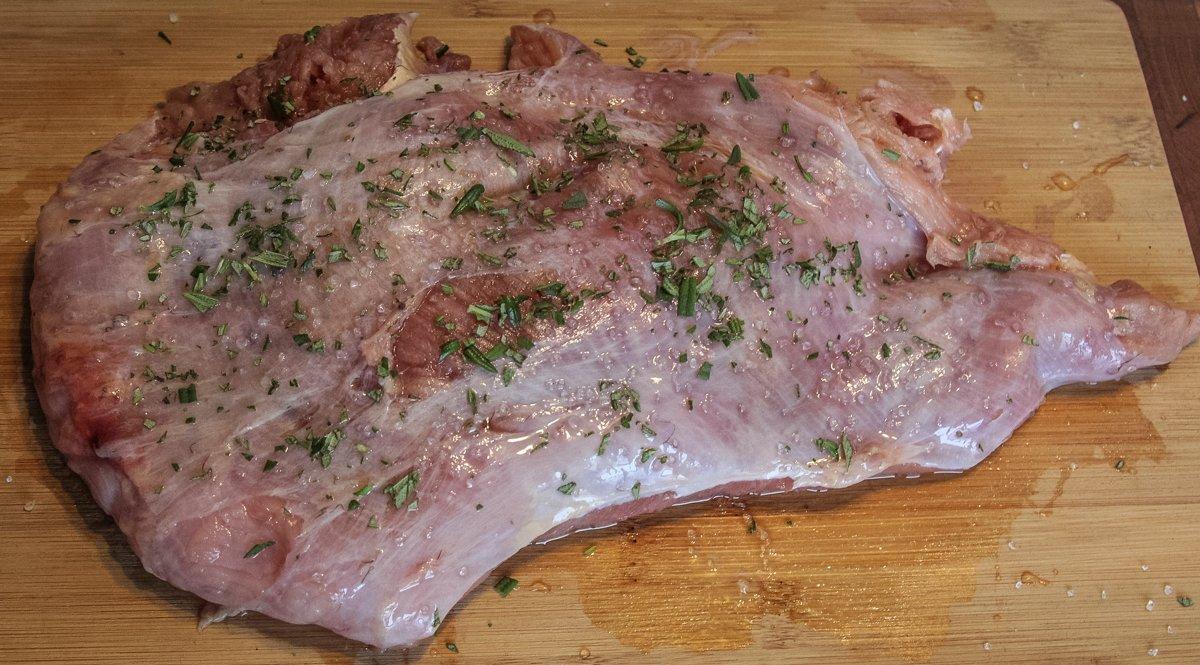 Season the turkey breast with a light sprinkle of salt and finely chopped fresh rosemary.