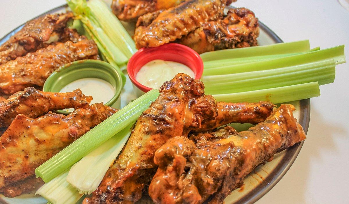 Serve the wings with traditional wing dipping sauces.