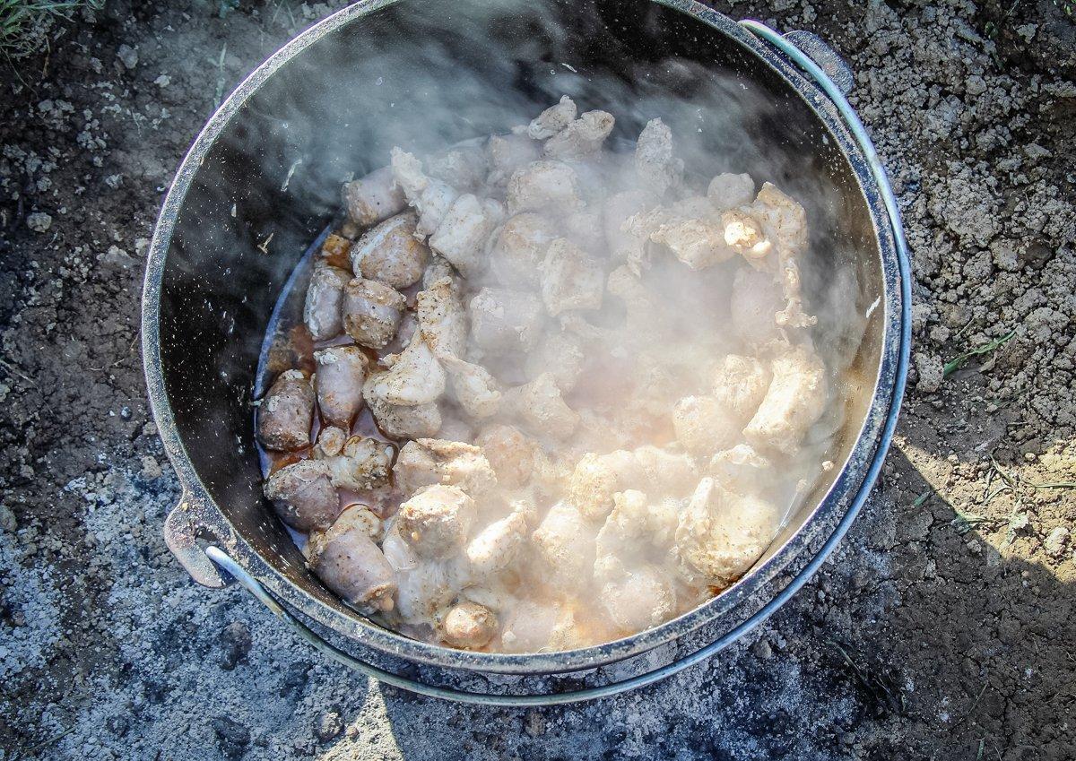 Start by browning the turkey and sausage together.