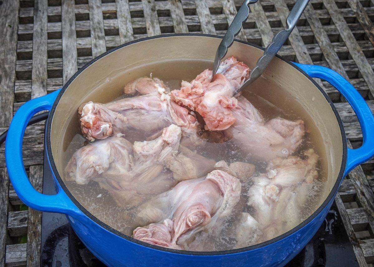 Simmer the turtle slowly in water with a bit of white vinegar for one hour to tenderize the meat.