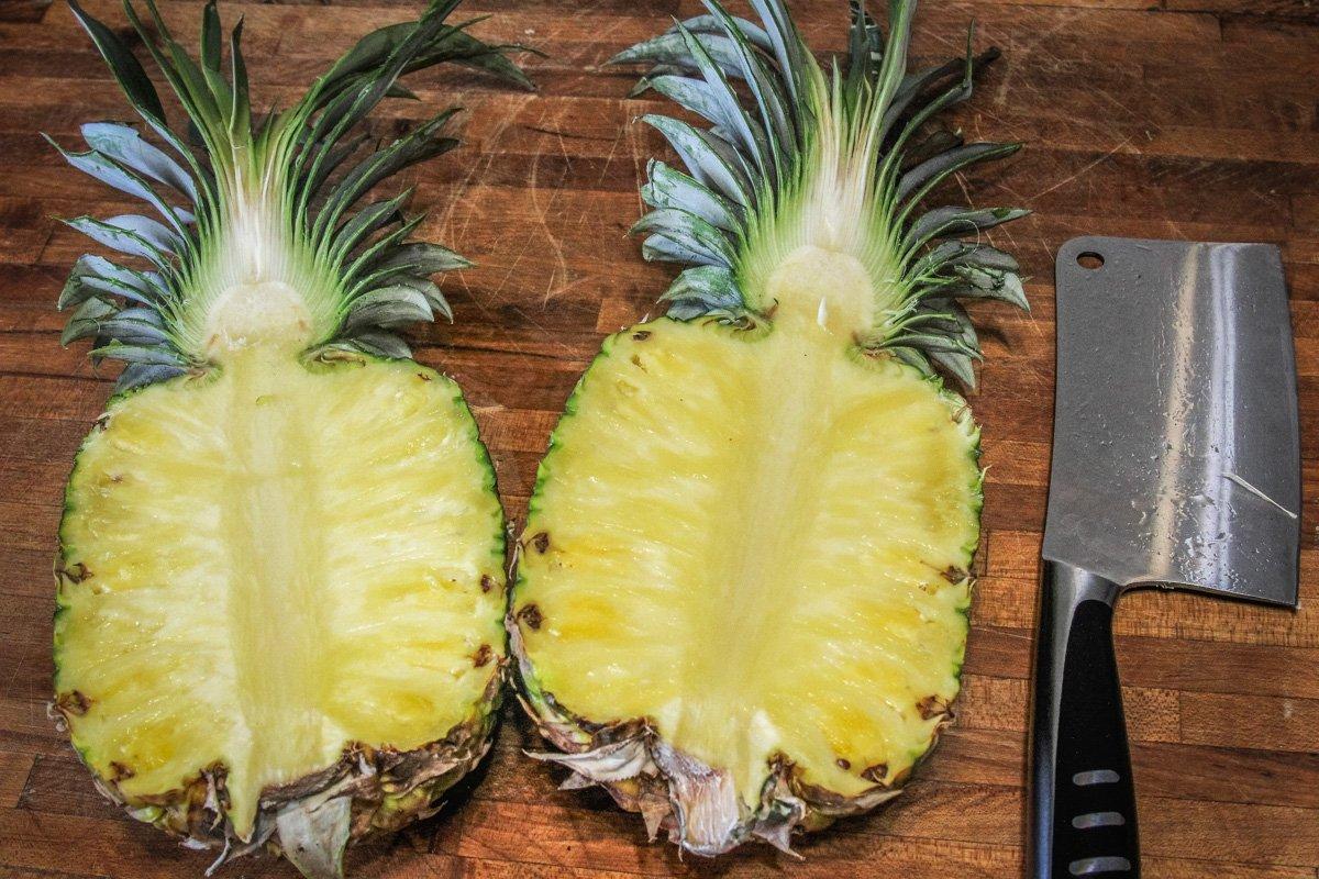 If using a whole pineapple, cut it in half vertically. 