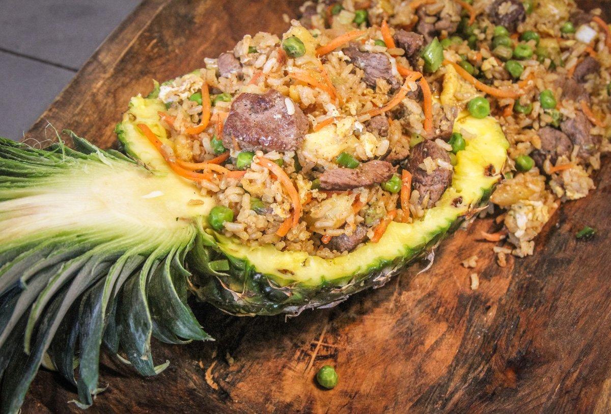 Serve the rice in the hollowed shell of the pineapple for extra flair.