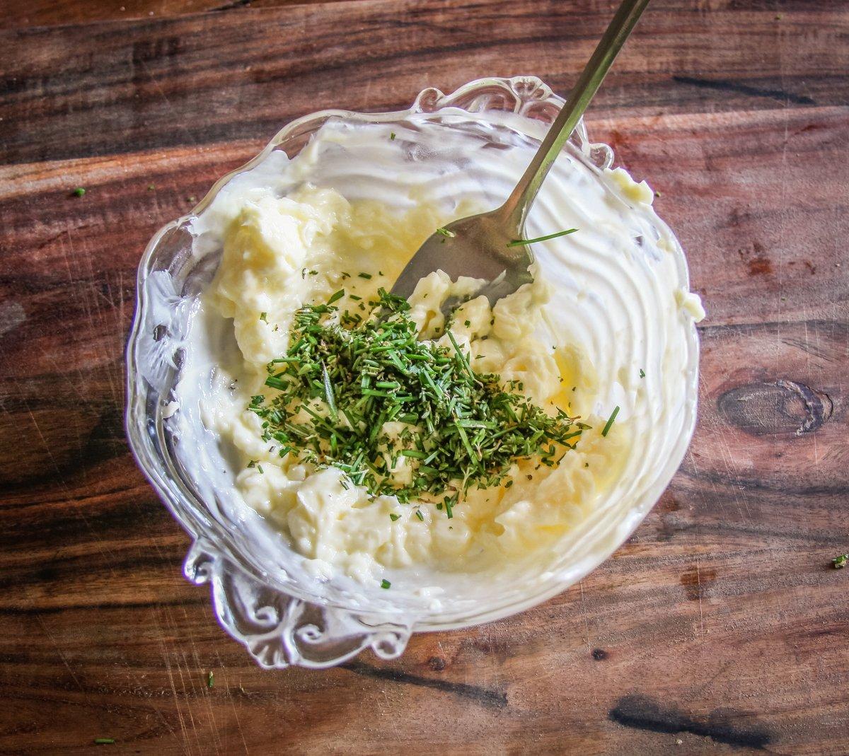 Mix the diced herbs into the softened butter.