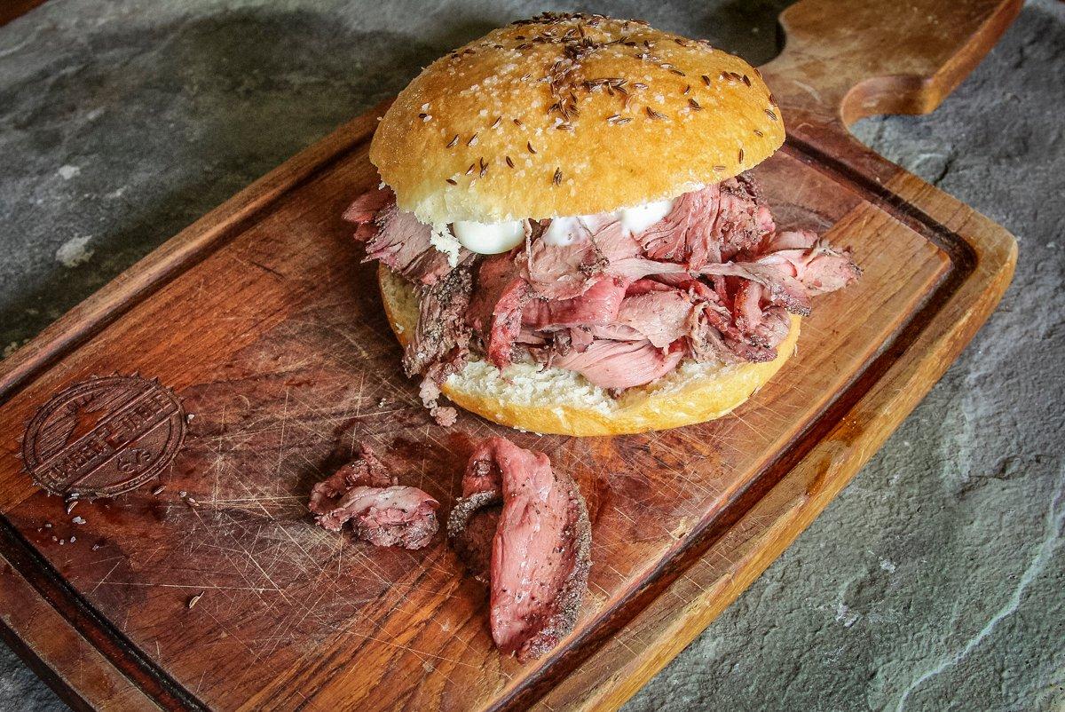 Pile the venison high on the bun and top it with horseradish.