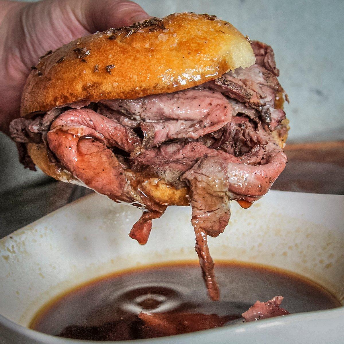 Serve the sandwich with a bowl of au jus for dipping.