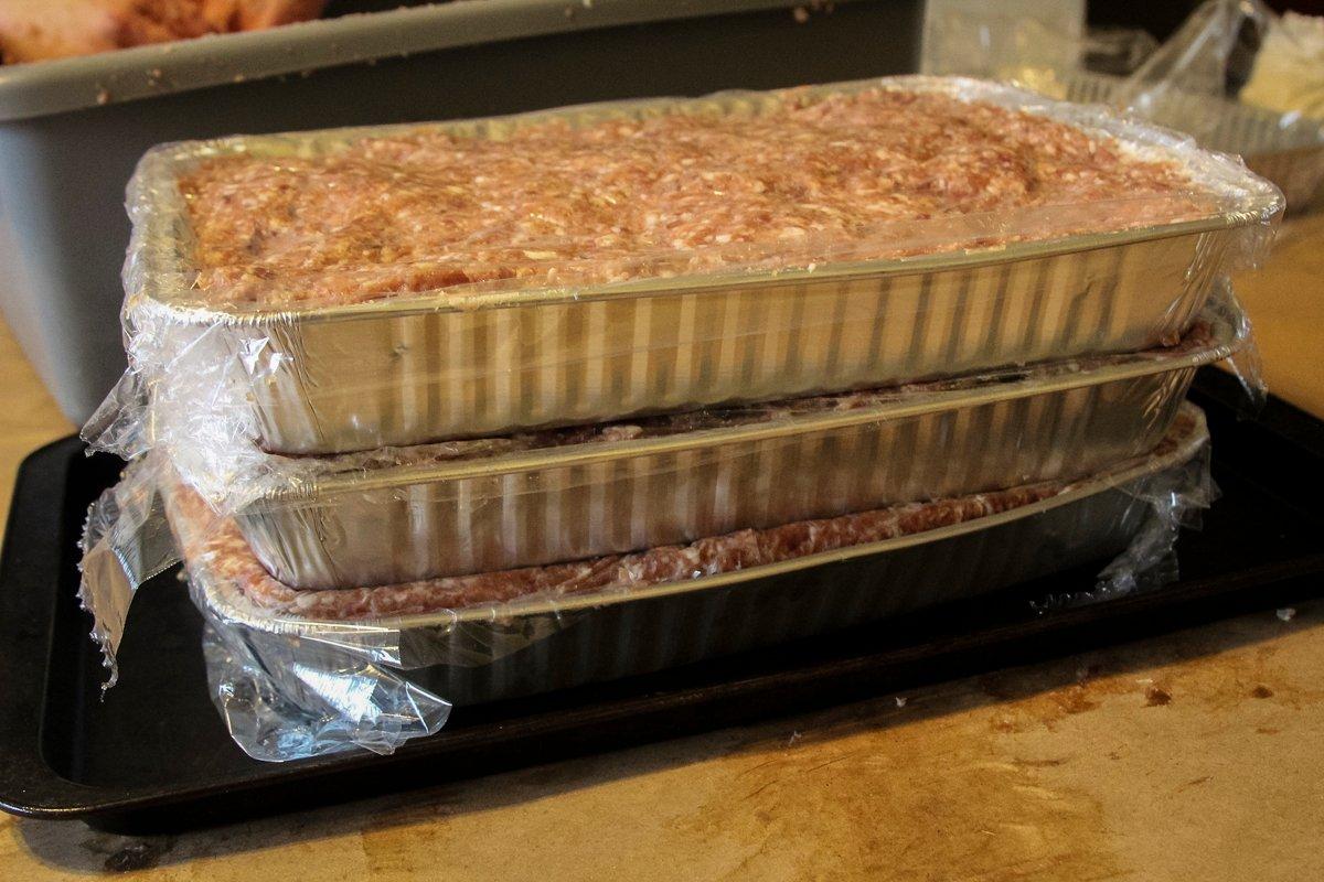 Pack the meat mixture into plastic-wrap-lined aluminum pans and refrigerate overnight.