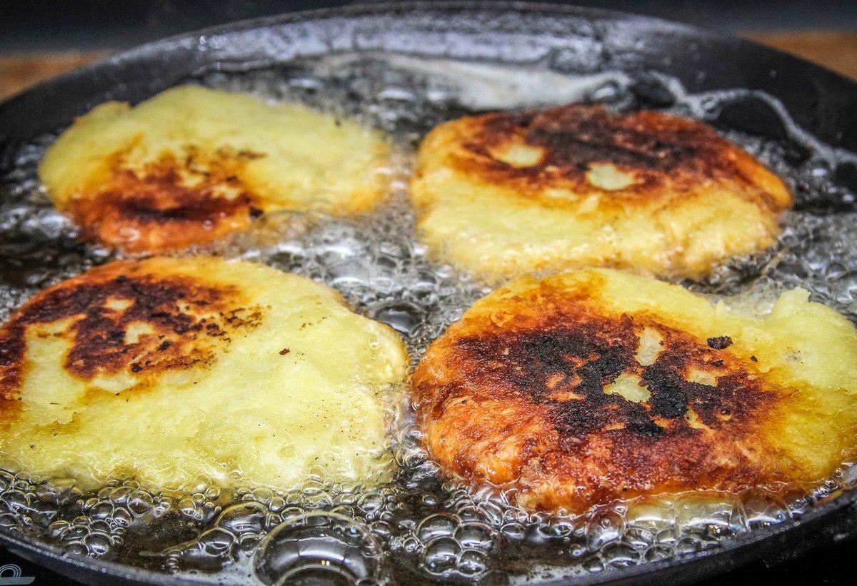 Fry the potato cakes till crispy on the outside while still tender in the center.