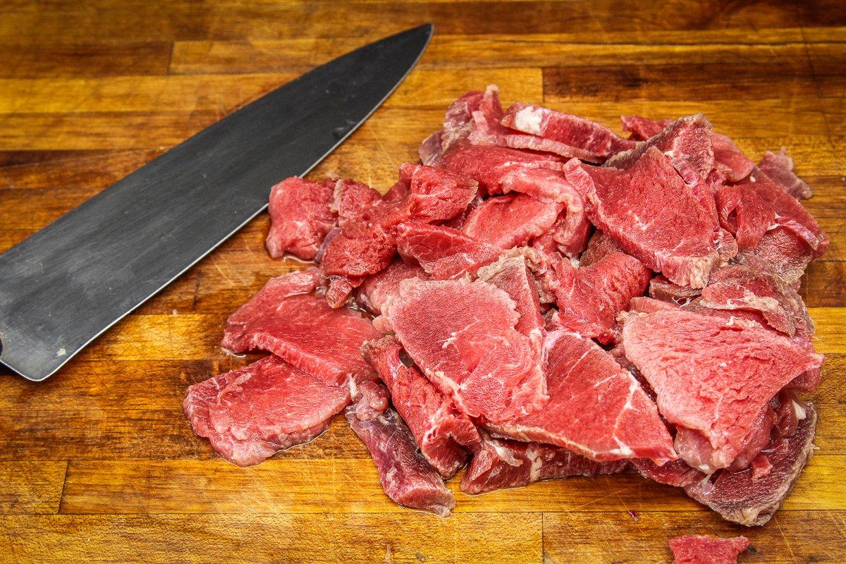 Slicing the venison while it is still partially frozen makes getting thin strips easier.