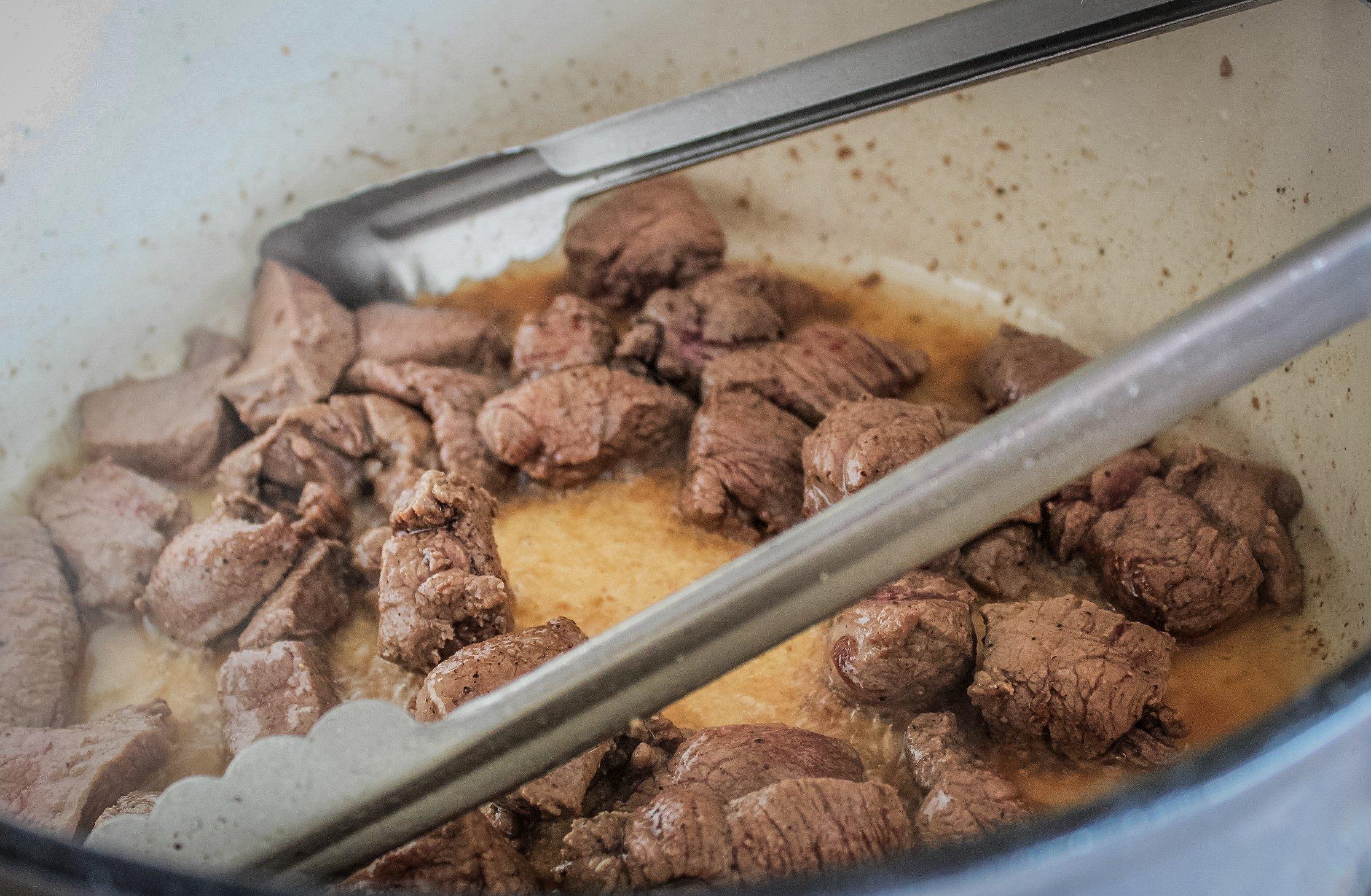 Brown the venison a batch at a time in smoking hot lard.