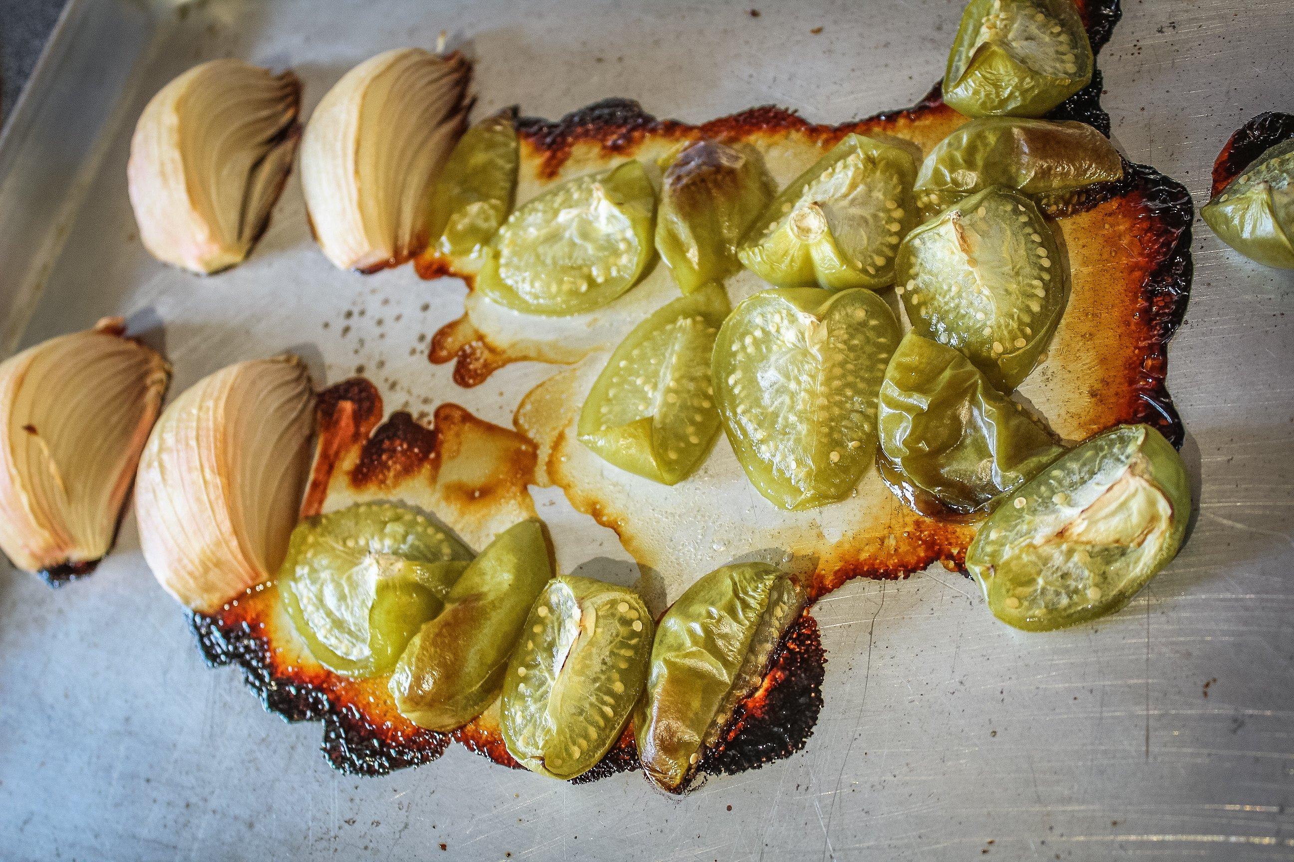 Roast the onion and tomatillos before adding to the pot.