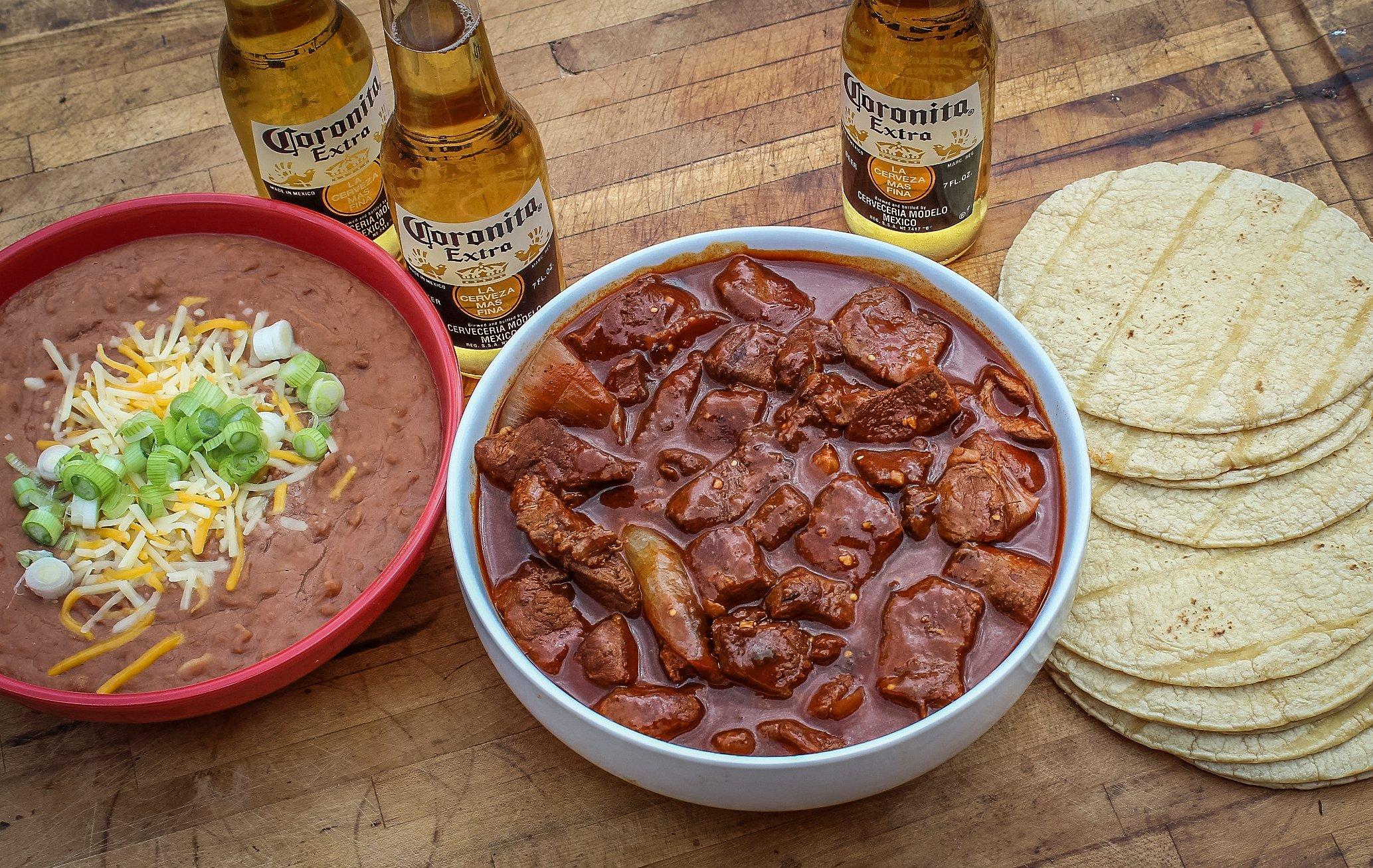 Serve the Chili Colorado with warm tortillas and beans.