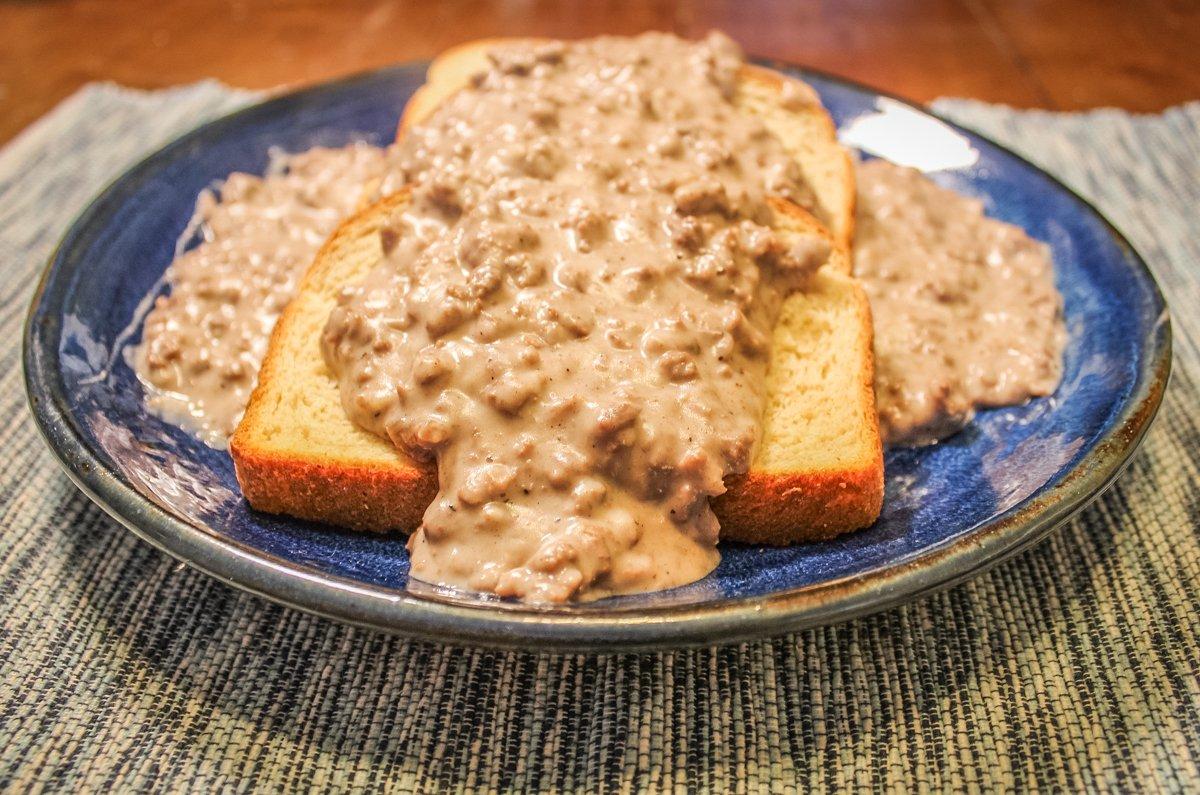 Spoon the gravy over your favorite toast. I am a big fan of freshly baked sourdough.