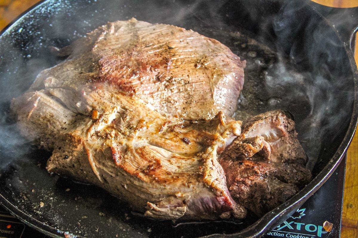 Brown the roast in bacon grease before adding it to the slow cooker.