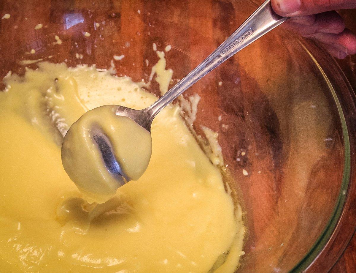 Cook the sauce until it is thick enough to coat the back of a spoon and leave a streak when you pull your finger across.