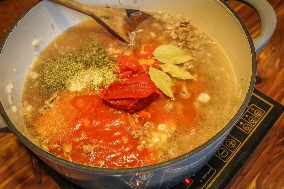 Stir the sauce ingredients into the browned venison and onions.