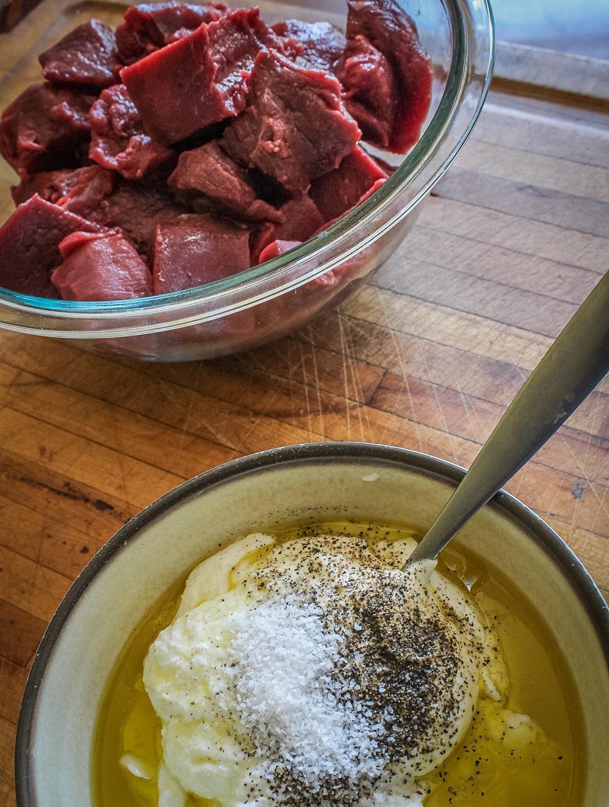 Mix the yogurt based marinade and pour over the venison cubes.