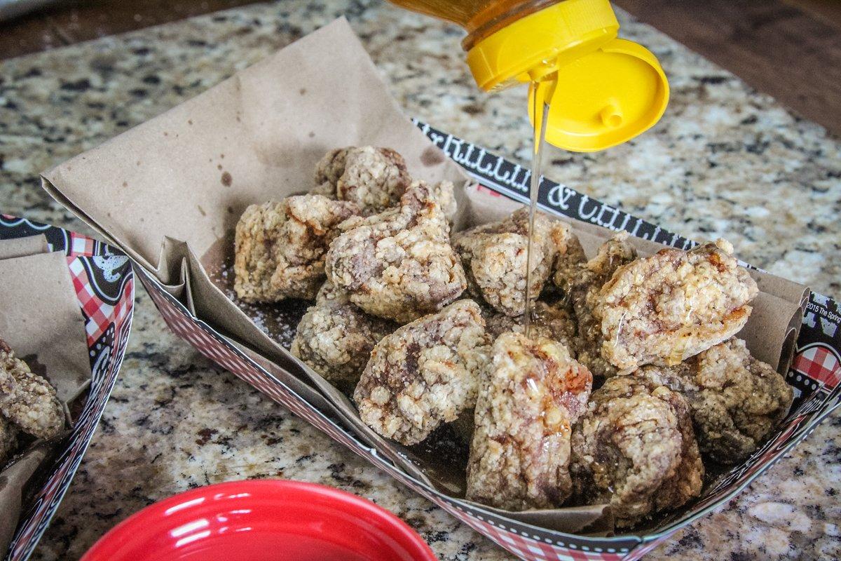 Drizzle honey over the crispy fried deer steak bites while they are still hot from the fryer.