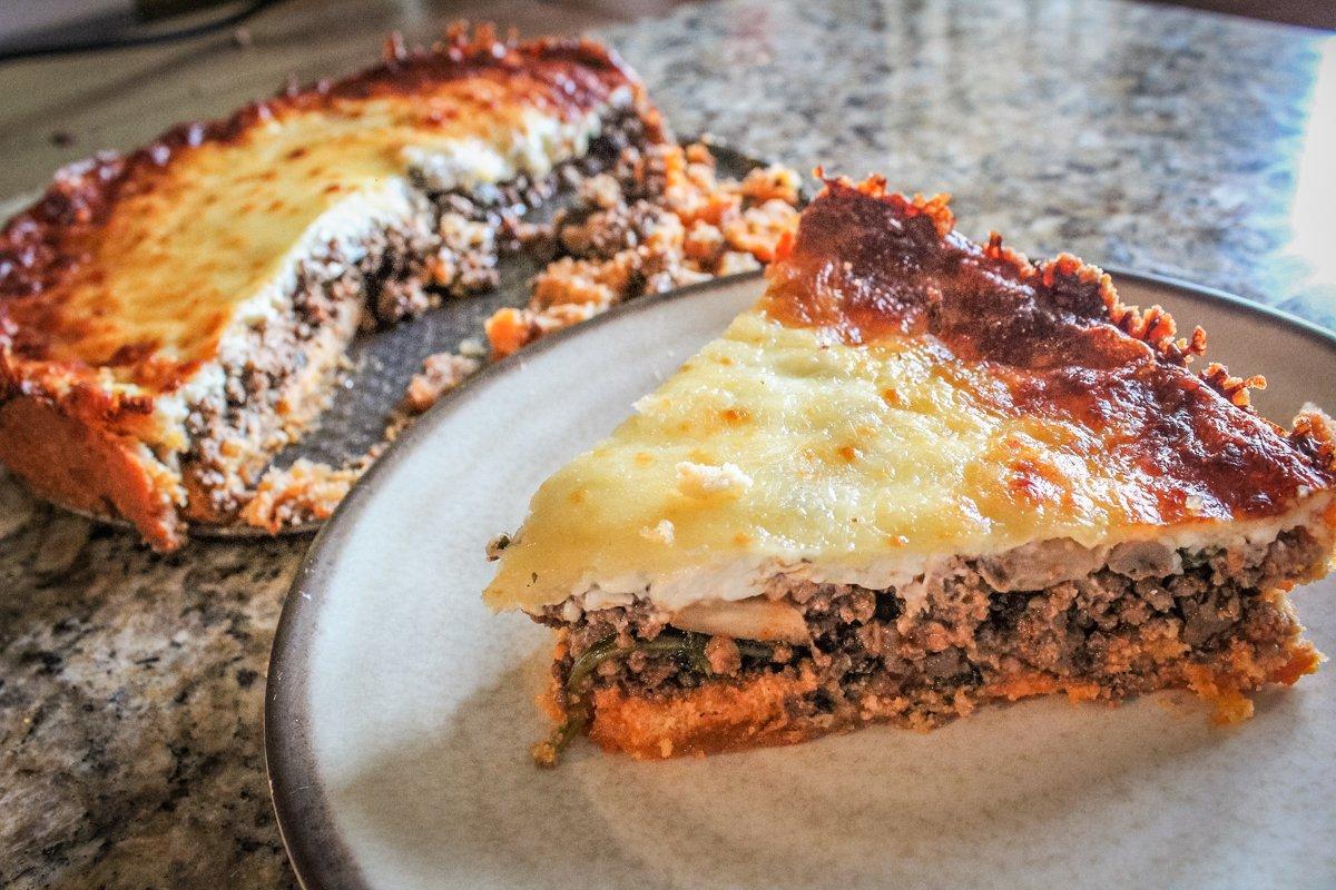 This cheesy meat pie is a dish everyone will love.