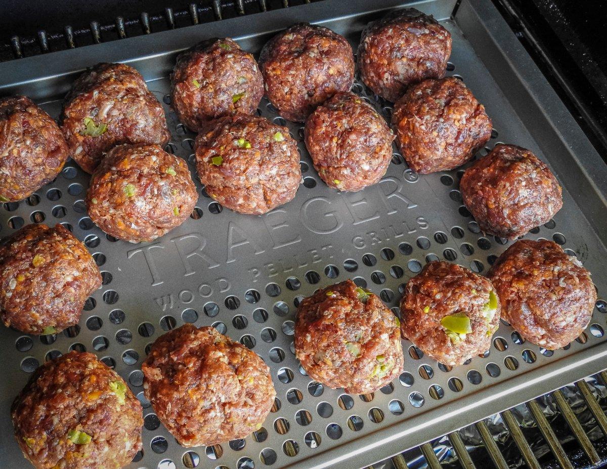 The meatballs get smoked on the Traeger pellet grill for maximum flavor.