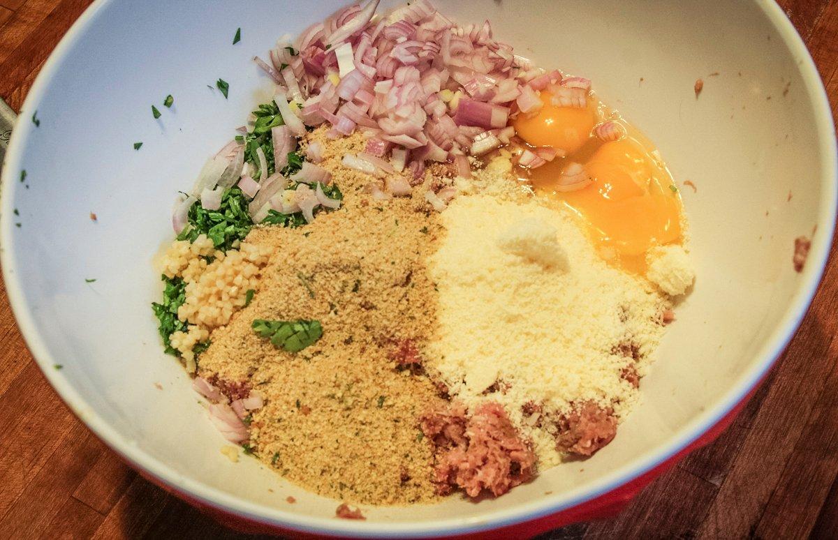 Blend the meatball ingredients in a large bowl.