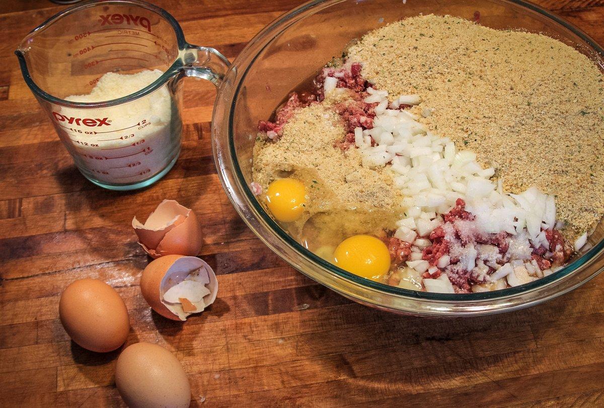 Mix the other meatloaf ingredients into the ground meat.