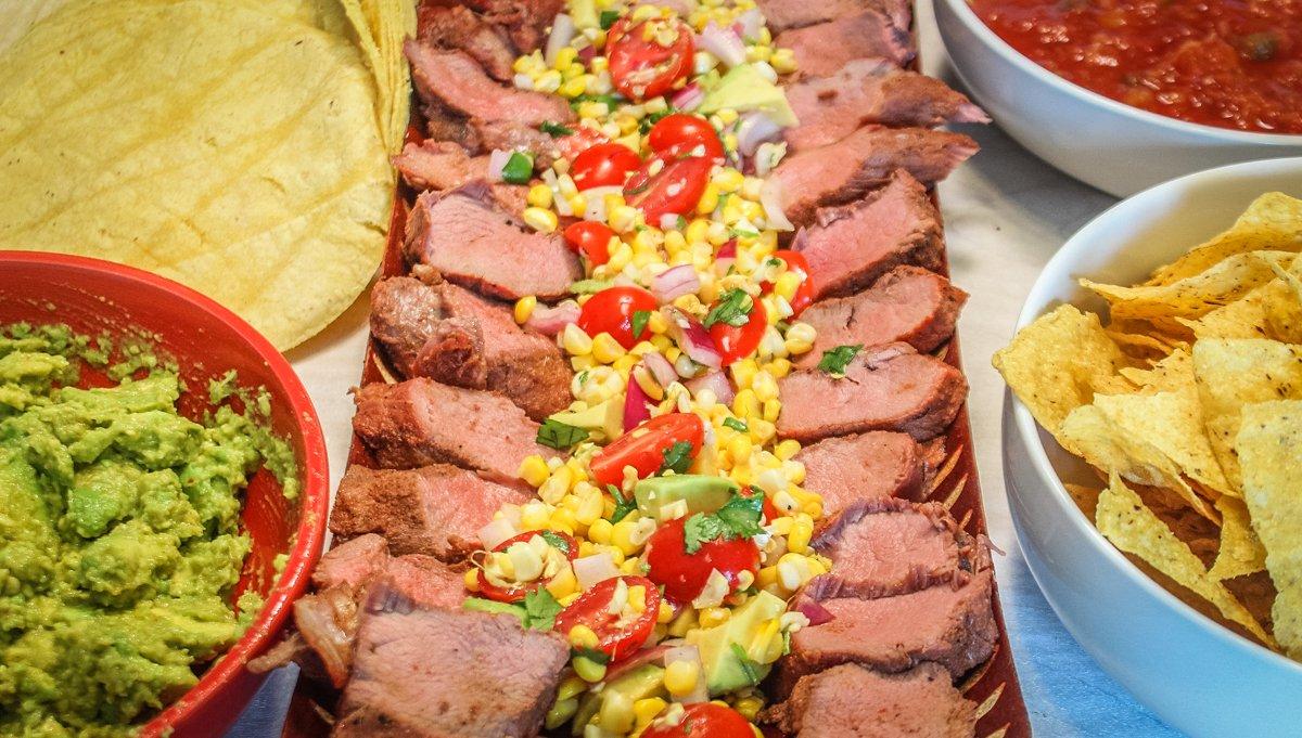 Spoon the salsa onto a large serving platter and stack the sliced backstrap around it for a nice presentation.