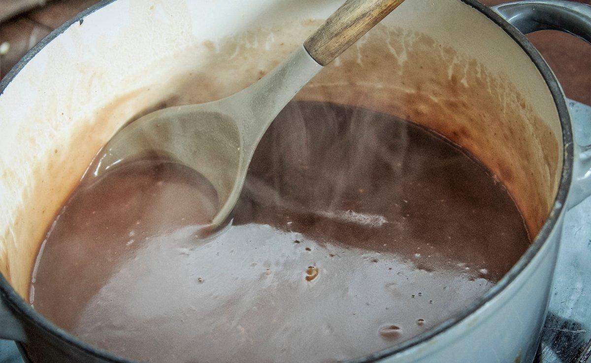 While the meatballs brown, make the gravy in a heavy saucepan.