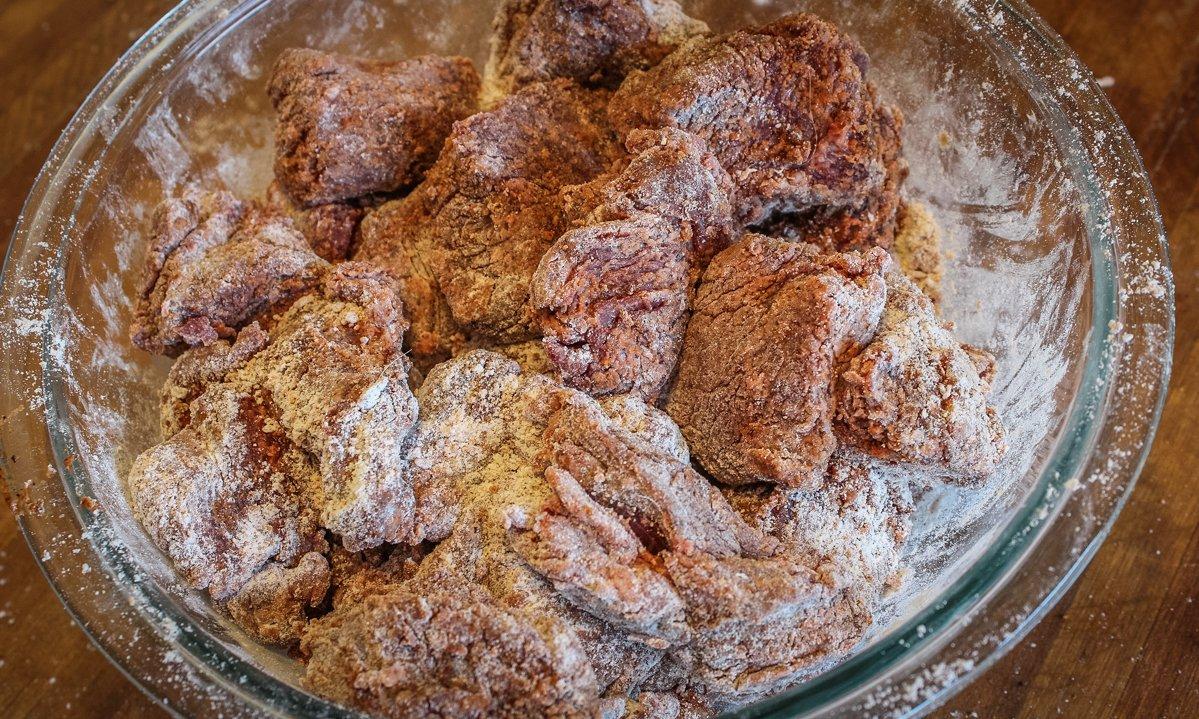 Dredge the venison in a mixture of flour and Traeger Coffee Rub.
