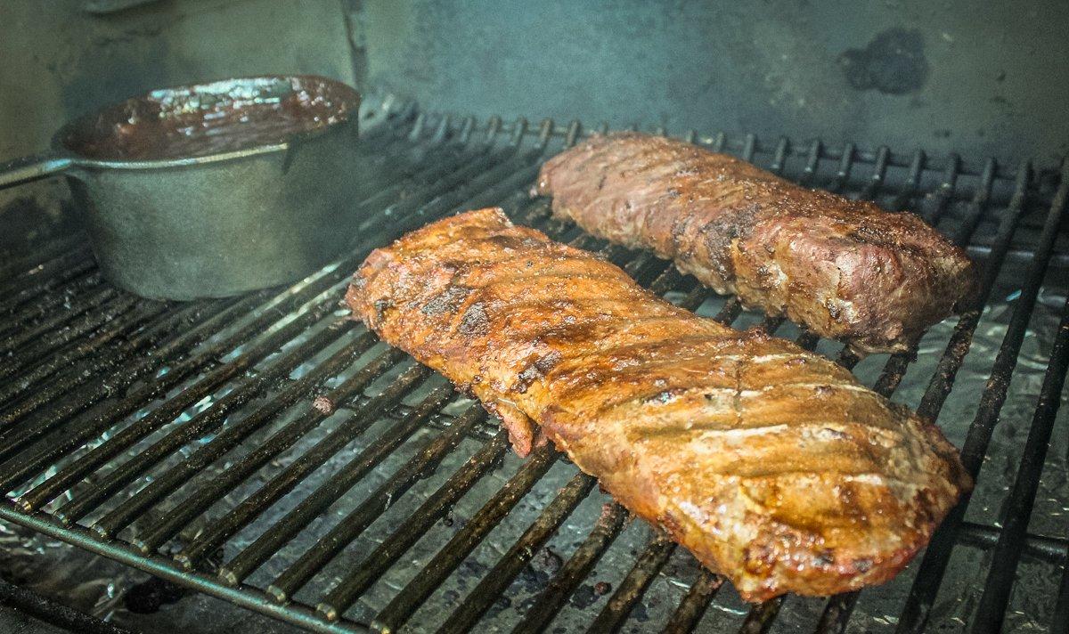 Grill the backstrap to your desired doneness while the sauce simmers on the grill.