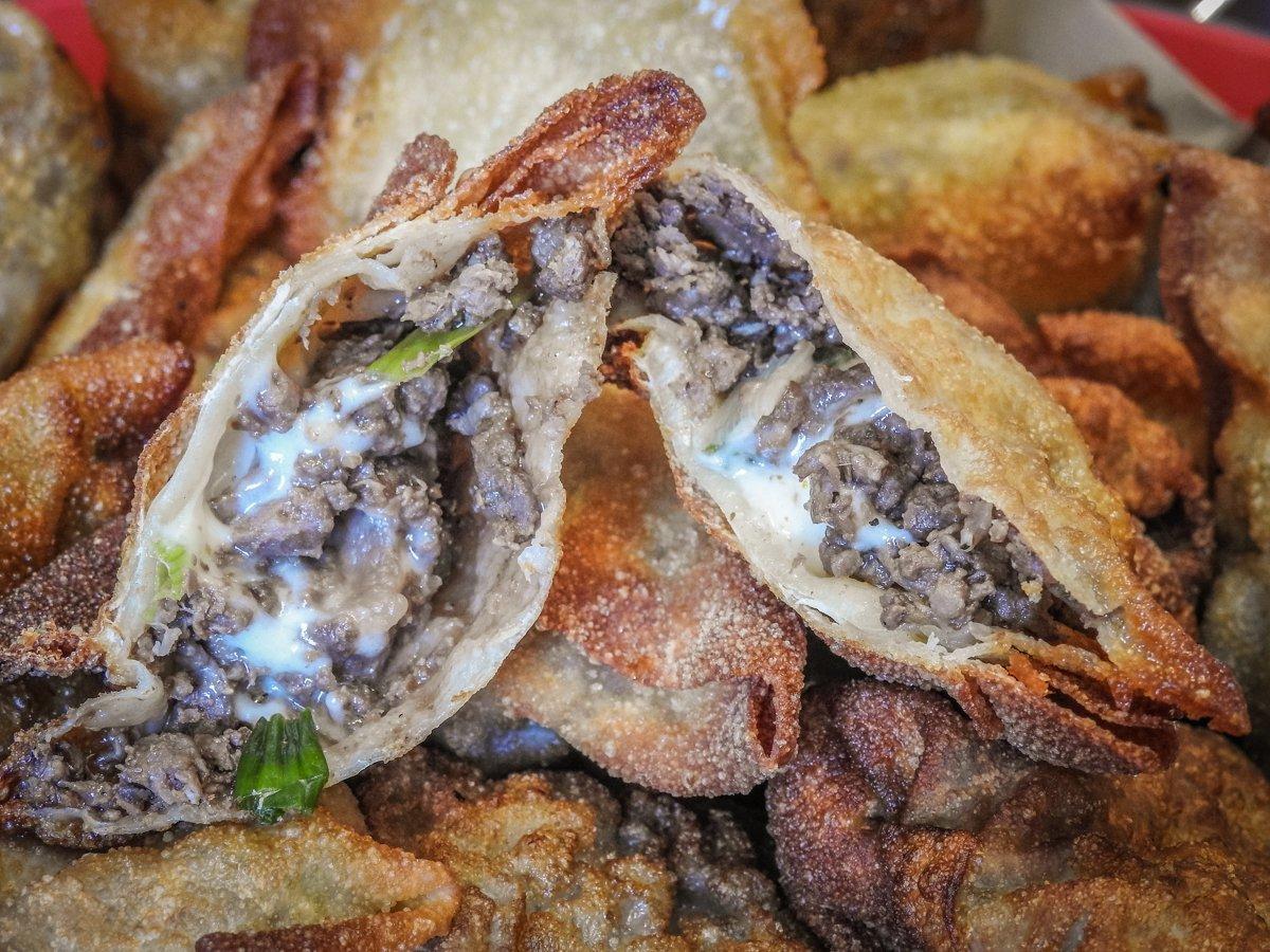 An Asian-inspired bbq cheeseburger tucked into a crispy fried shell. How could you go wrong?