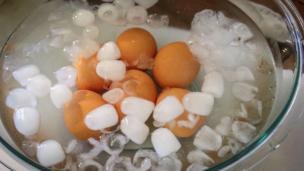 Shock the soft boiled eggs in icewater to stop the cooking process.